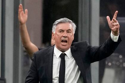 Real Madrid's head coach Carlo Ancelotti shouts during the Champions League group D soccer match between Inter Milan and Real Madrid at the San Siro stadium in Milan, Italy, Wednesday, Sept. 15, 2021. (AP Photo/Antonio Calanni)