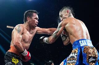 Regreso de Pacquiao se queda apenas corto; Barrios retiene título welter con empate mayoritario