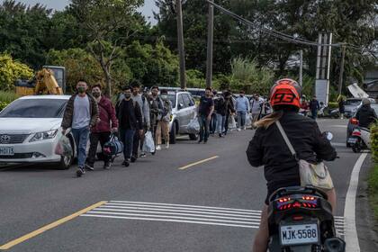 Reservistas después de completar un programa de capacitación de actualización de dos semanas en Taoyuan, Taiwán, el 18 de marzo de 2022. (Lam Yik Fei/The New York Times)