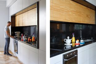 Revestido en granito ‘Negro Brasil’ el mueble contiene anafe, mesada y pileta. "Quería una ‘cocina no cocina’ porque, la verdad, la uso muy poco", admite Leandro
