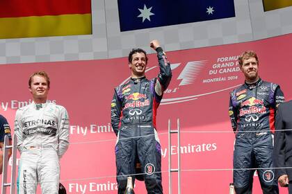 Otros tiempos: Daniel Ricciardo sonríe desde lo más alto del podio en Canadá 2014, flanqueado por Nico Rosberg (Mercedes) y Sebastian Vettel (Red Bull Racing)
