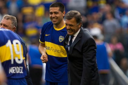 Riquelme se saludó con Russo