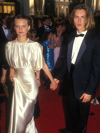 River y la actriz Martha Plimpton, su entonces pareja, en los Oscars de 1989 en los que el actor estaba nominado por el film Running on Empty