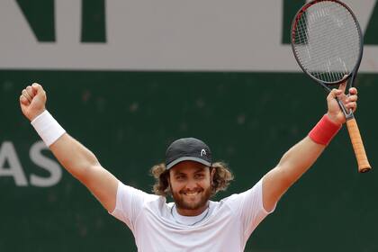 Marco Trungelliti celebra su victoria sobre Bernard Tomic