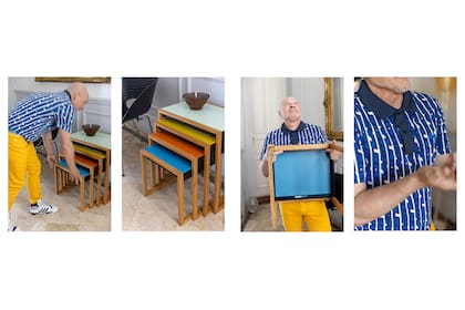 Ronnie acomoda las mesitas nido de Vitra y muestra encantado su sello original.