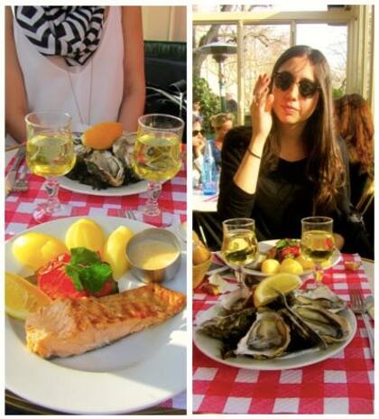 Salmón grillado con papas por un lado y ostras por el otro