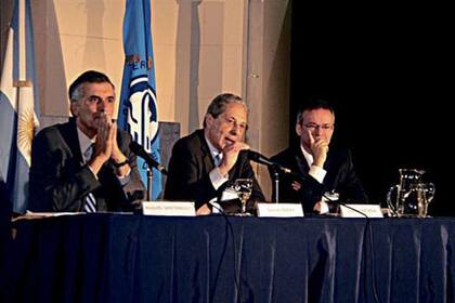 Santángelo, Marx y Artana, ayer, en la conferencia de FIEL