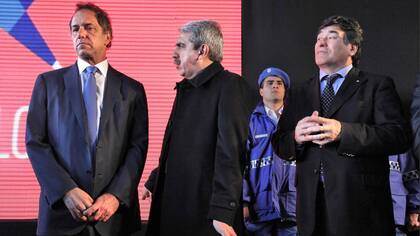 Scioli, Aníbal y Zannini, durante un acto de campaña