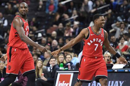 Serge Ibaka y Kyle Lowry, dos campeones con los Raptors que van por más