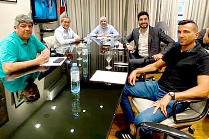 Sergio Sasia, al lado de Hugo Moyano, cuando logró hace tres años el aval de Camioneros para liderar la Confederación de Trabajadores del Transporte