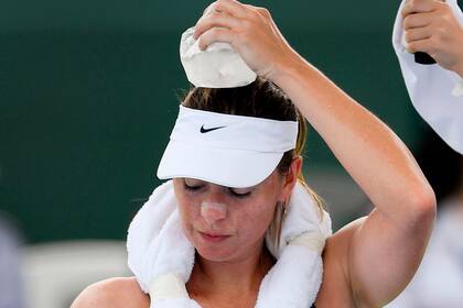 Sharapova, víctima del calor y el humo durante la exhibición de Kooyong