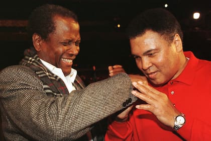 Con Muhammad Ali, otro ícono afroamericano
