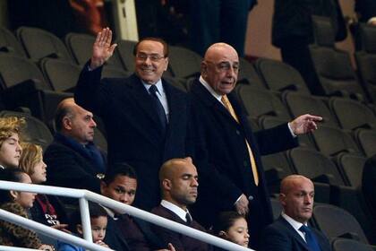 Silvio Berlusconi junto a Adriano Ganniani