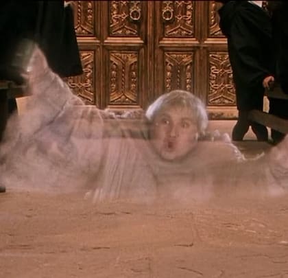 Simon como el Fraile Gordo en Harry Potter y la piedra filosofal