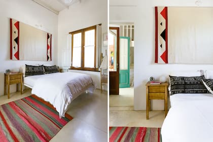 Sobre la cama, a modo de tapiz, una alfombra de Seclantás. Juego de almohadones de lino africano (Linos Vintage). En el piso, la clásica alfombra norteña comprada en un viaje por Purmamarca.