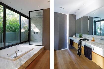 Sobre la mesada de mármol, jardín de suculentas (Fête), kimono negro (Pezkoi) y bandeja de madera (Angie del Bajo) con set de baño (Llum Velas).