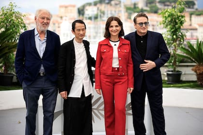 Juntos, dinamita: el chef Pierre Gagnaire, el director Tran Anh Hung, Binoche y Benoit Magimel posaron radiantes en Cannes