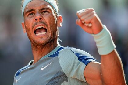 Spain's Rafael Nadal celebrates a point against David Goffin of Belgium during their match at the Mutua Madrid Open tennis tournament in Madrid, Spain, Thursday, May 5, 2022. (AP Photo/Manu Fernandez)