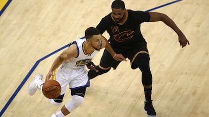 Stephen Curry y Tristan Thompson