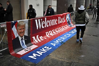 Supporters of US President-elect Donald Trump arrive for a MAGA victory rally at Capital One Arena in Washington, DC, on January 19, 2025, one day ahead of Trump's inauguration. (Photo by ANGELA WEISS / AFP)