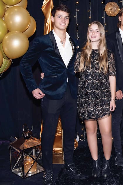 Sus hijos Taína y Tiziano.