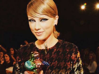 Taylor con su Moon Man