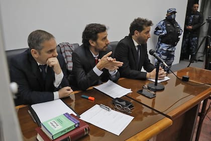 Los fiscales Andrés Quintana, Federico González y Patricio Ferrari durante una de las audiencias del juicio