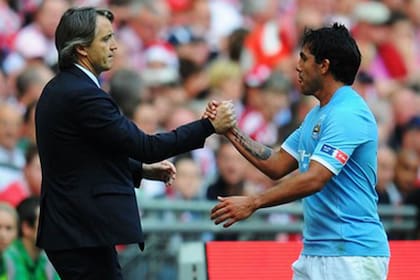 En su paso como técnico de Manchester City, Mancini tuvo a Carlos Tevez entre sus dirigidos