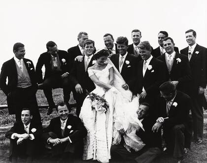 The wedding of John F. Kennedy to Jacqueline Bouvier in 1953. Kennedy's brothers Edward and Robert stand by him. (Photo by © CORBIS/Corbis via Getty Images)