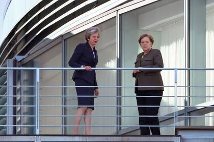 Theresa May y Angela Merkel reunidas en Berlín.