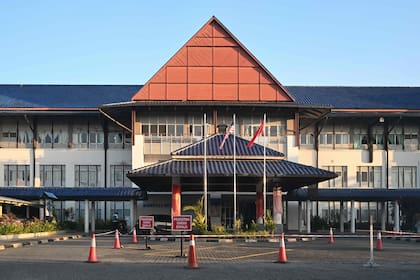 This photo shows a general view of the main entrance of Sultanah Maliha Hospital, where Norway's King Harald V has been admitted with an infection, on Malaysia's resort island of Langkawi on February 29, 2024. Norway's King Harald V, aged 87 and in poor health, is "improving" from an infection that forced him to be hospitalised while on holiday in Malaysia, his office said February 28. (Photo by Mohd RASFAN / AFP)�