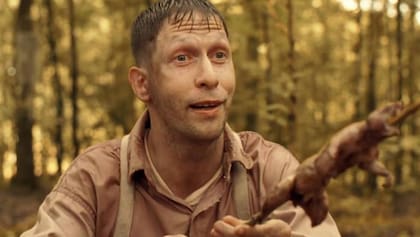 Tim Blake Nelson en ¿Dónde estás, hermano?, la película de 2000 de los Coen