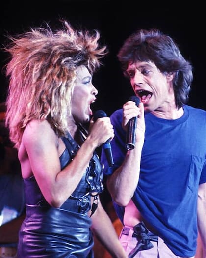 Tina Turner junto a Mick Jagger, a quien le enseñó a bailar
