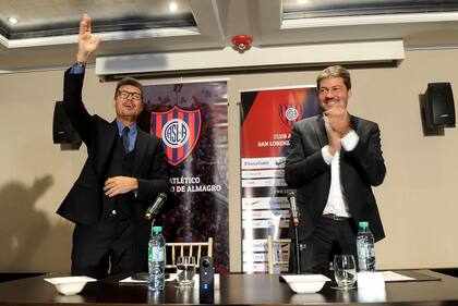 Tinelli y Lammens esta semana, el miércoles, luego de firmar el boleto de compraventa