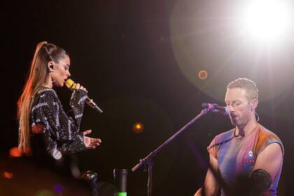 Tini y Chris Martin, en el Monumental, en noviembre de 2022