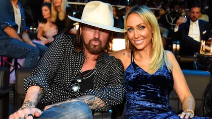 Tish y Billy Ray Cirus intentaron divorciarse por primera vez en 2010 ( Crédito: Kevin Mazur/WireImage
