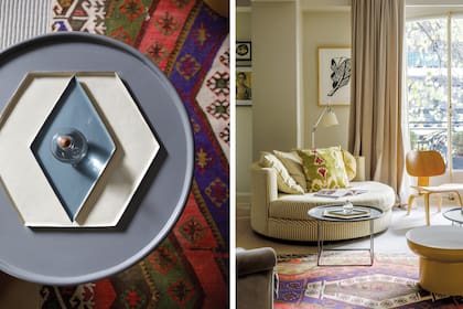 Tomás Magrane y Martina Correa superpusieron alfombras rayadas con kilims en el living de su casa de arquitectura francesa y muebles de diseño contemporáneo.