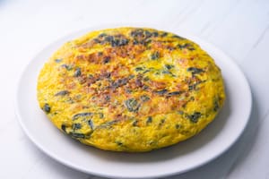 Tortilla de papa, espinaca y queso