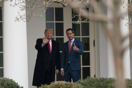El líder opositor Juan Guaidó y Donald Trump