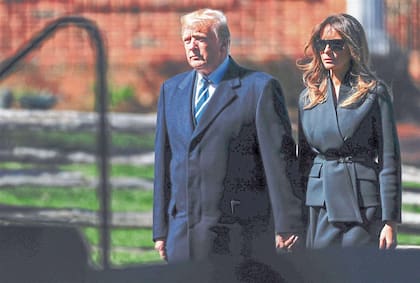 Trump y Melania en el funeral del evangelista Billy Graham