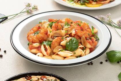 Un clásico, pastas con tomate pero rallado.