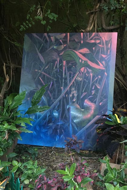 Un cuadro pintado por el novio también fue parte de la decoración del jardín.