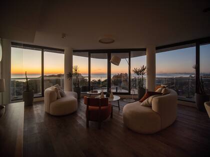 Un departamento amplio y con vistas panorámicas del atardecer