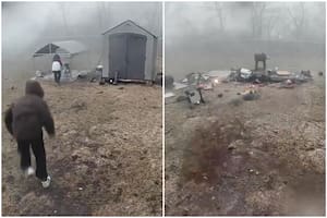 Un padre y su hijo corrieron bajo la lluvia para salvar al perro segundos antes del impacto