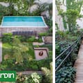 Una rampa en zigzag organiza un jardín en terraza con césped, fogón, solárium y pileta