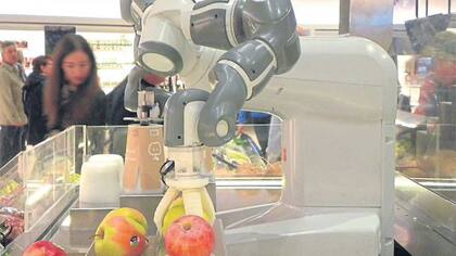 Un robot que elige manzanas