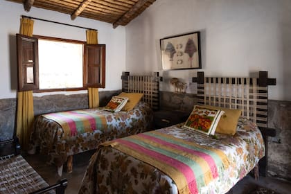Una de las cálidas habitaciones de Las Queñuas.