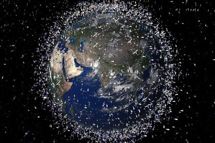 Una representación artística de la Agencia Espacial Europea con los 12.000 satélites y objetos que orbitan alrededor de la Tierra