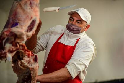 Uno de los mercados más afectados por las restricciones del Gobierno fue el de China (Foto de RONALDO SCHEMIDT / AFP)