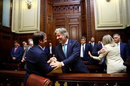 Viola junto a Juan Bautista Mahiques, ministro de Justicia